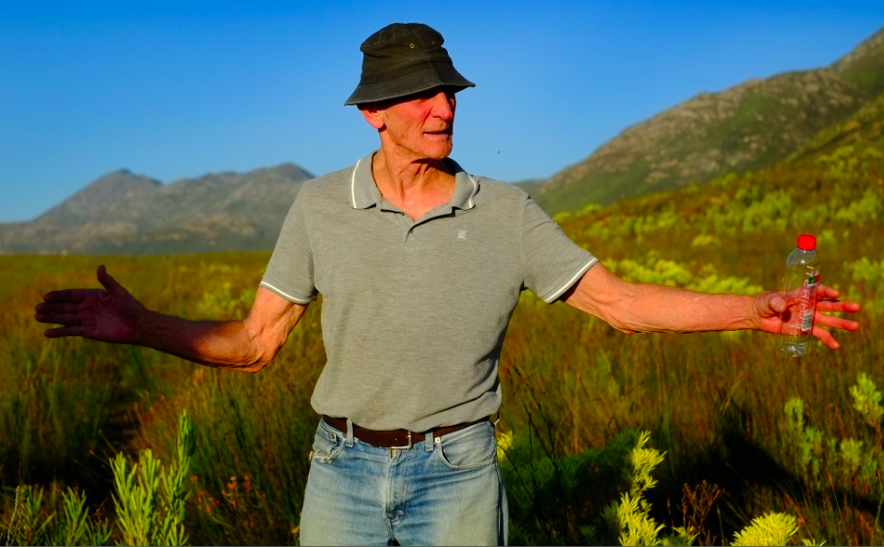 Peter showing us his route over the mountain to Grootvadersbosh
